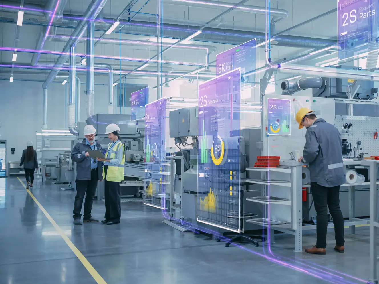 Moderne Industrieanlage mit vernetzten Maschinen und digitaler Steuerung.