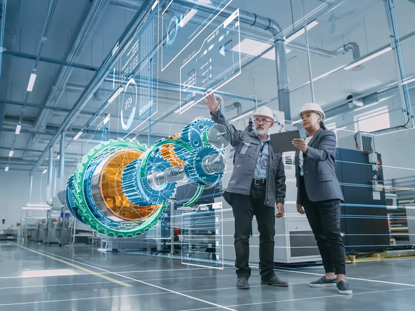Ingenieure prüfen digitale Industrie 4.0 Software in moderner Fabrik.