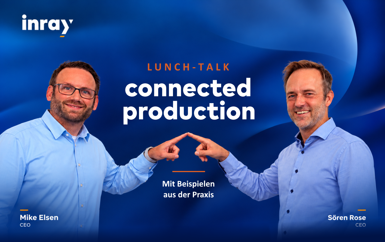 Two men at a lunch discussion on Industry 4.0 and digitalization.